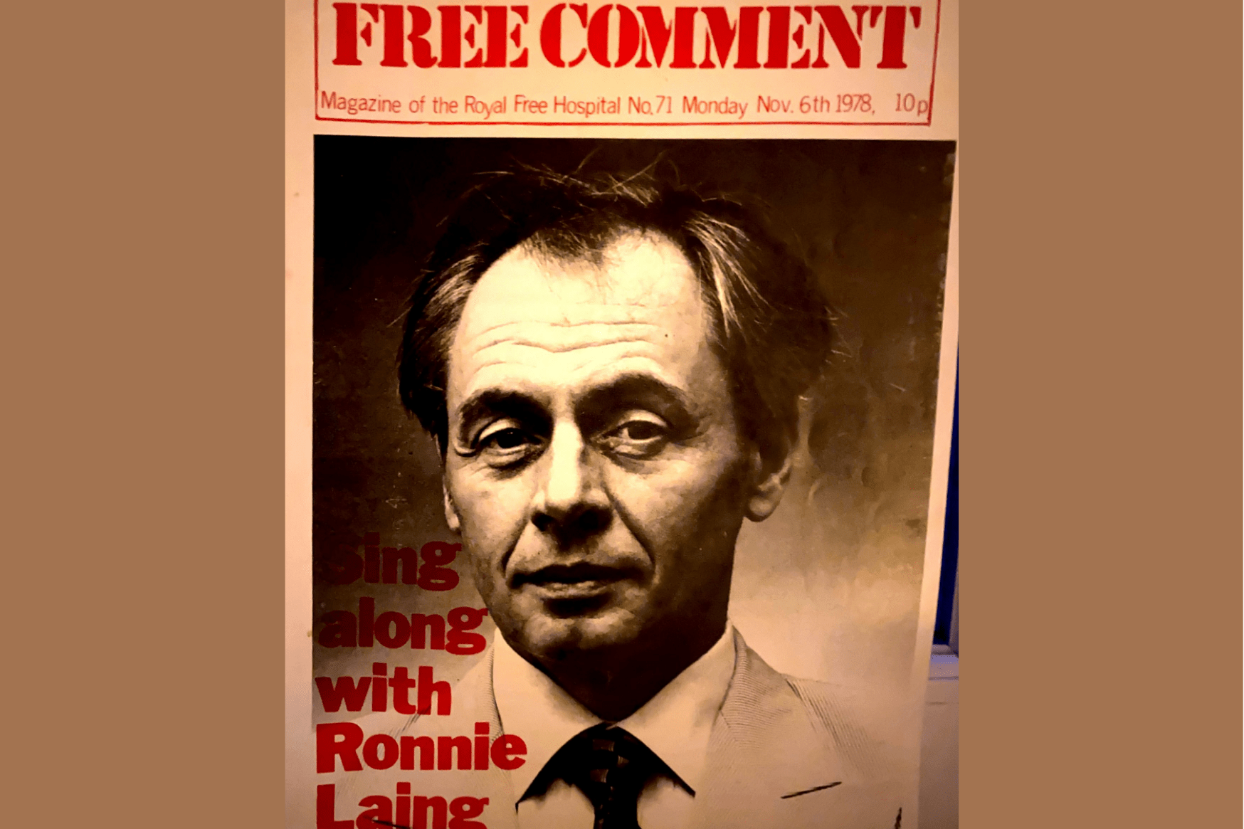 The front cover of the 'Free Comment' student magazine, featuring a picture of psychiatrist RD Laing. The title is 'Sing along with Ronnie Laing'.
